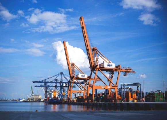 An image of cranes at a pier