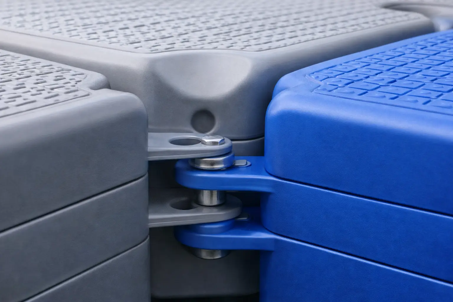 Close-up of heavy-duty galvanized corner brackets and double-joist bolting