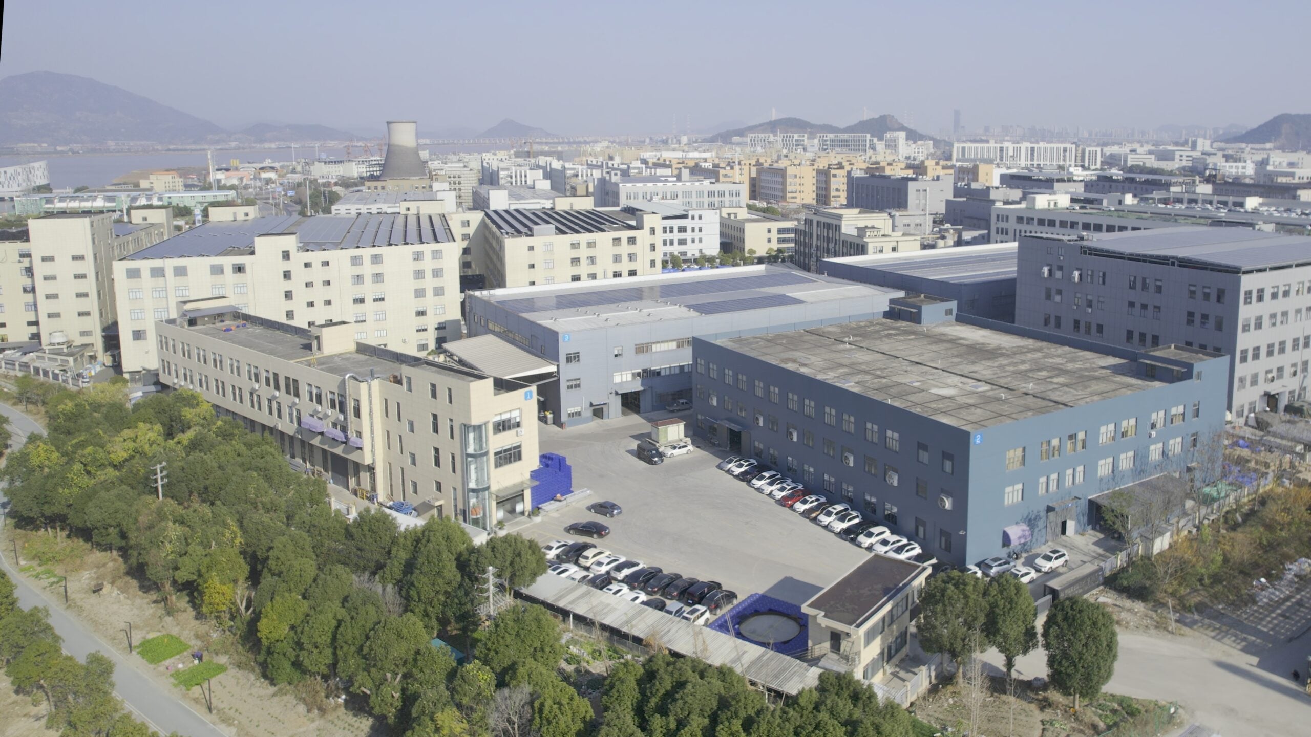 Company-supplied aerial view of factory buildings and grounds