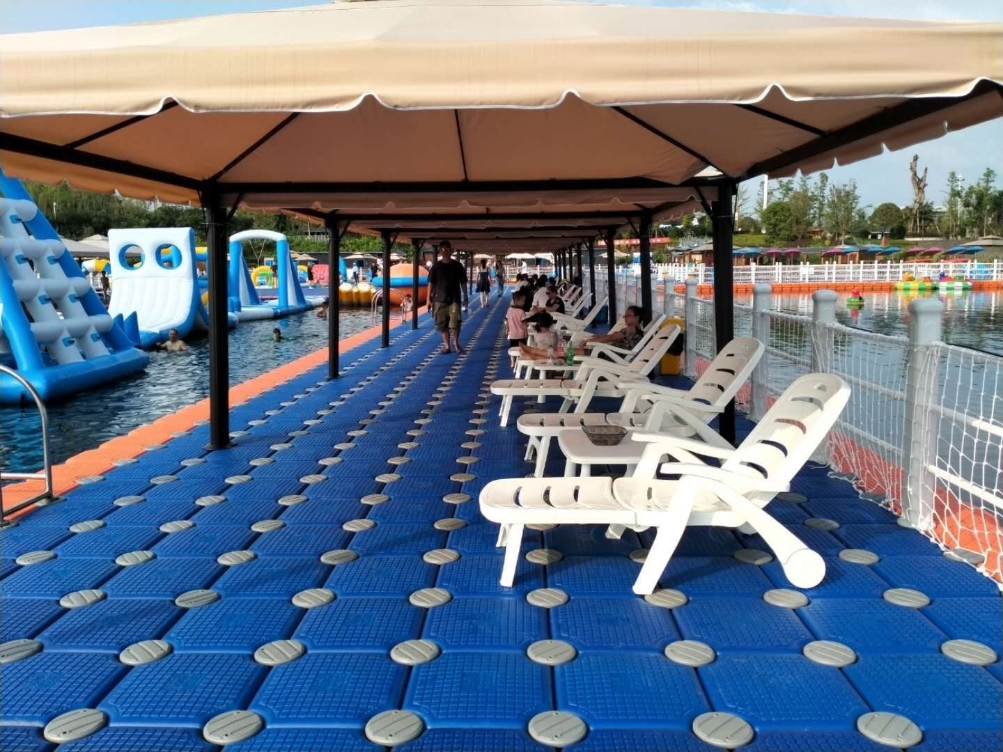Canopy and reclining chairs on a modular floating platform